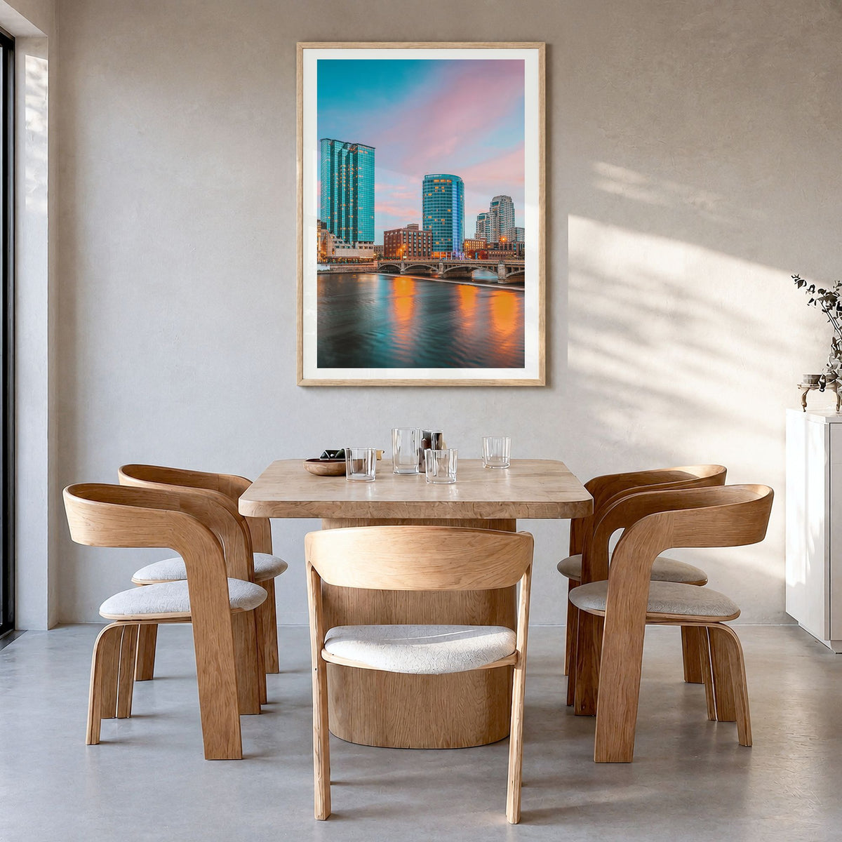 Grand Rapids Photo No 1 Poster in a natural wood frame, hanging in a dining room, white border
