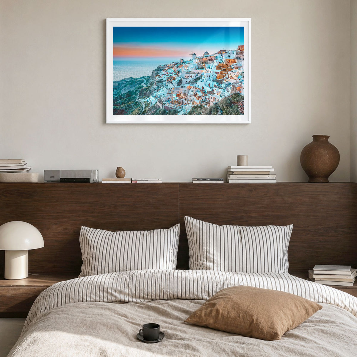 Greece Photo Poster in a white wood frame, hanging in a bedroom, white border