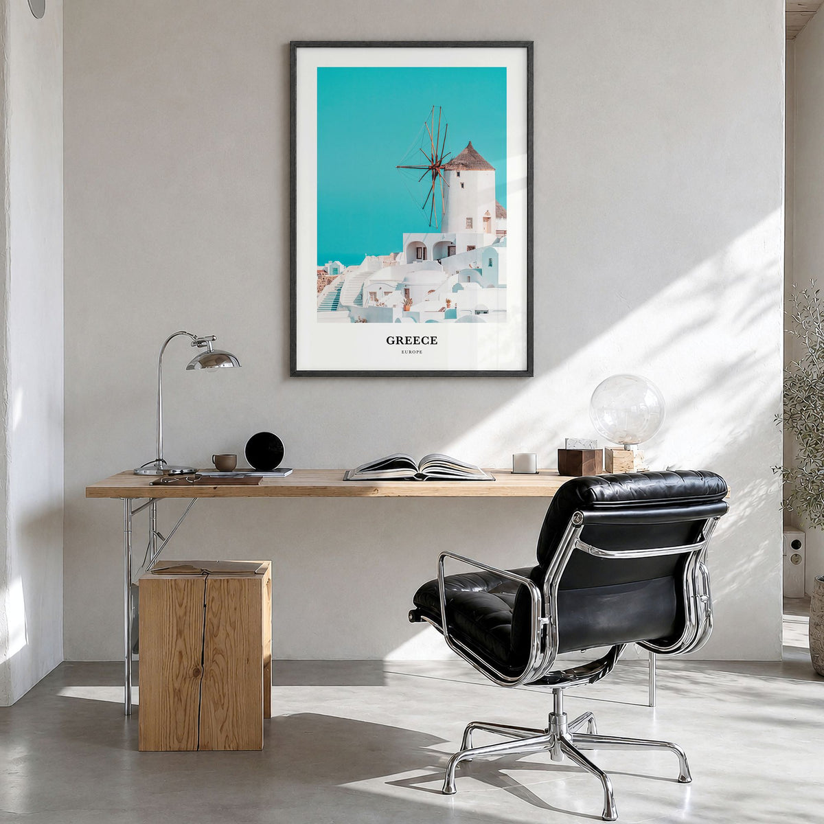 Greece Classic Poster in a black wood frame, hanging in a bright home office