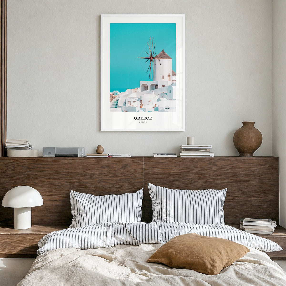 Greece Classic Poster in a white wood frame, hanging in a bedroom