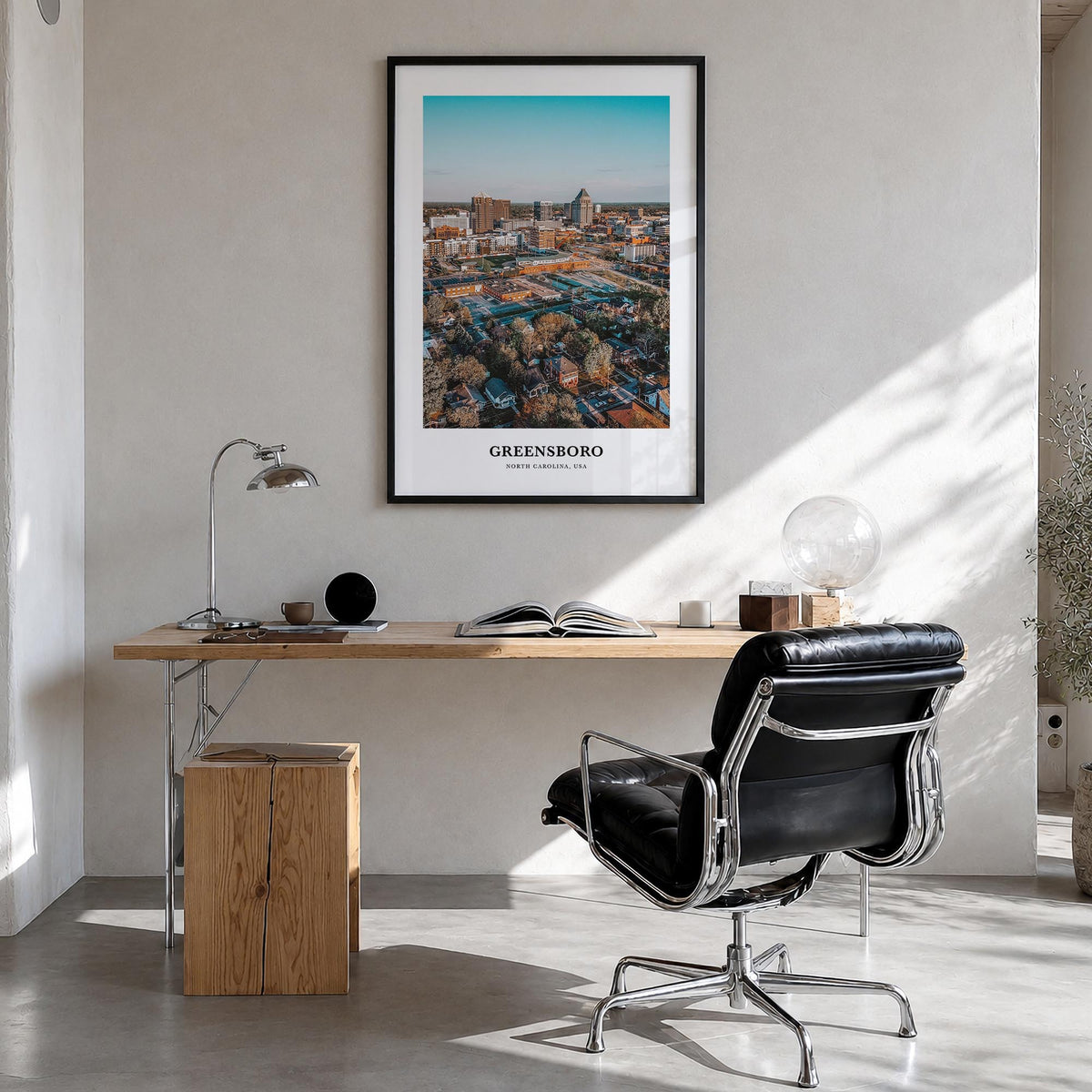 Greensboro colorful classic poster of North Carolina, USA – vertical wall art in black wood frame, hanging on wall
