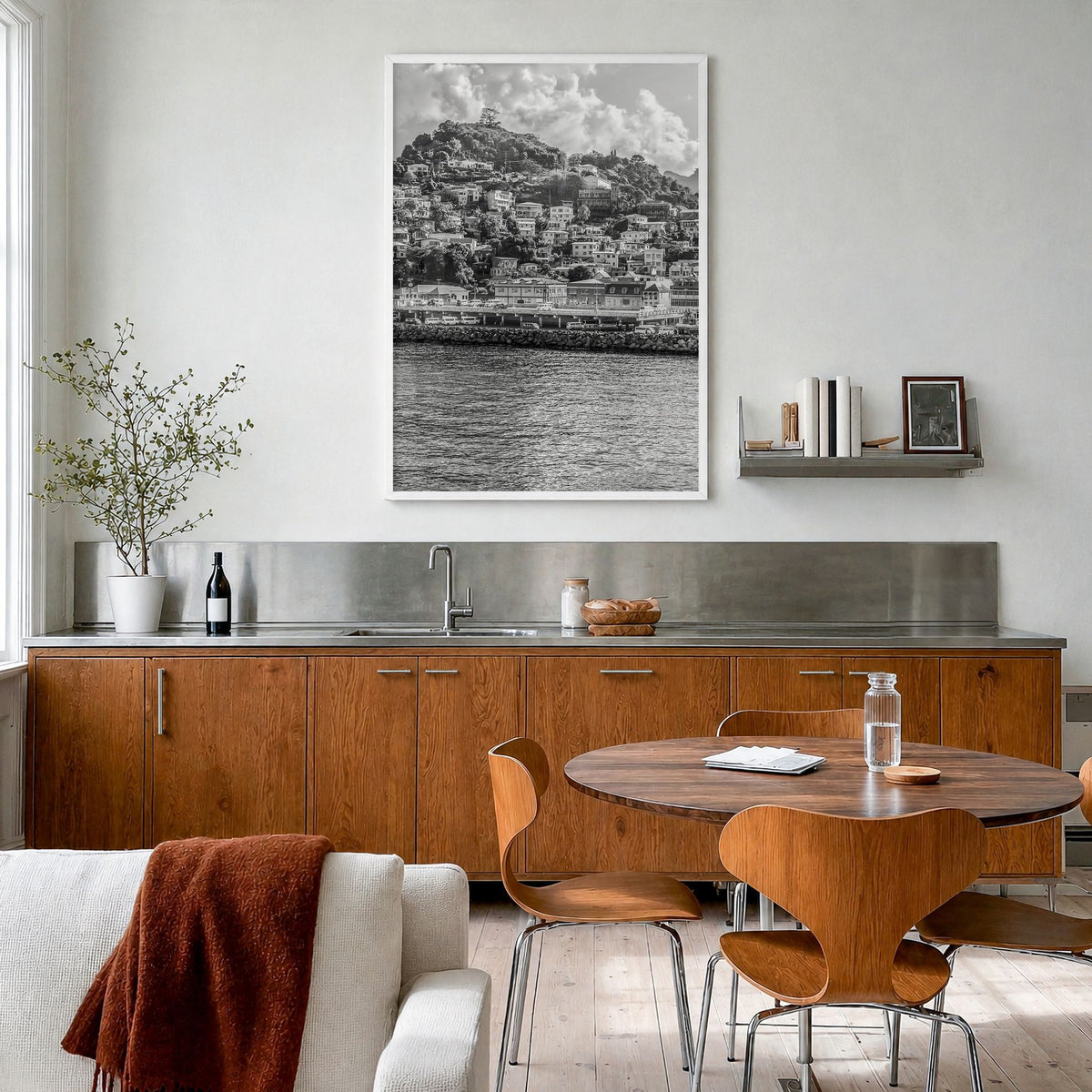Grenada Photo Poster in a white wood frame, hanging in a kitchen with a dining area, full image (no border)