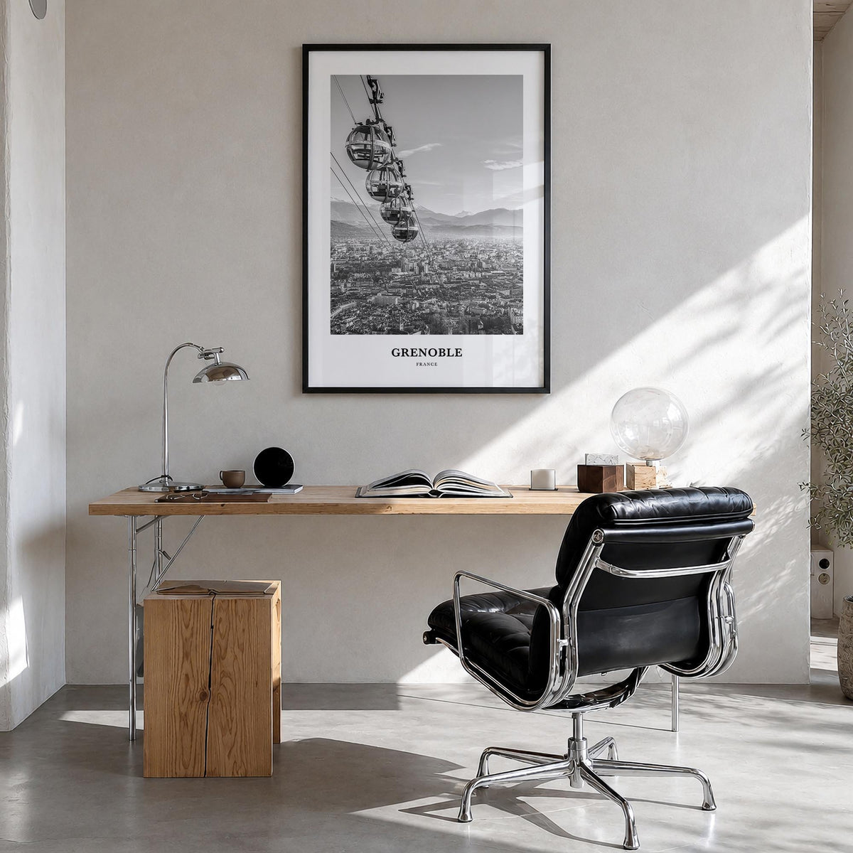 Grenoble black & white classic poster of France – vertical wall art in black wood frame, hanging on wall