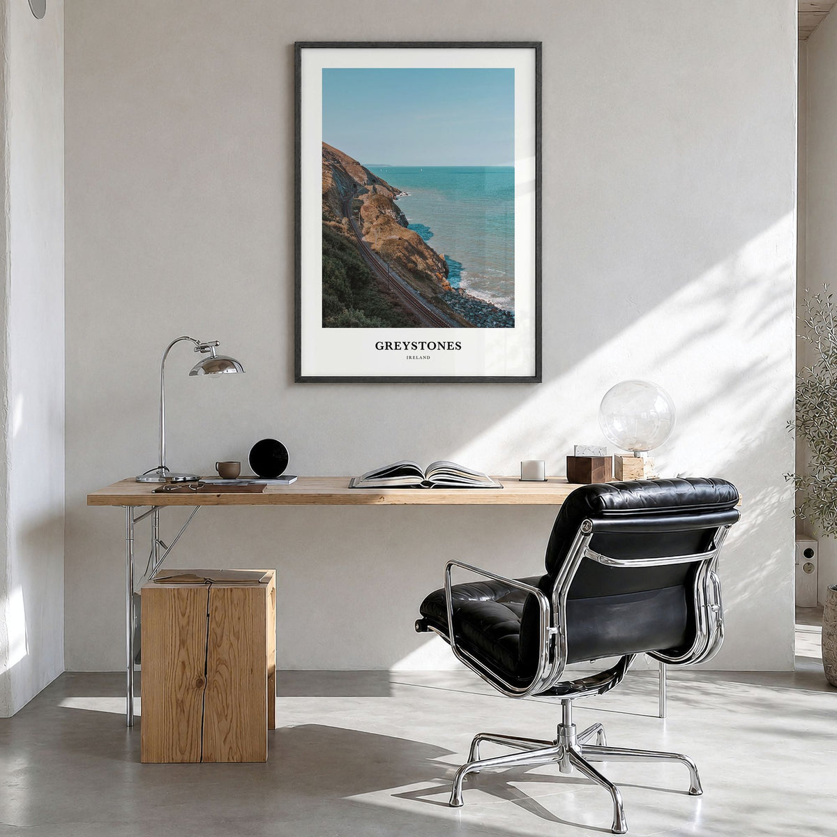 Greystones Classic Poster in a black wood frame, hanging in a bright home office