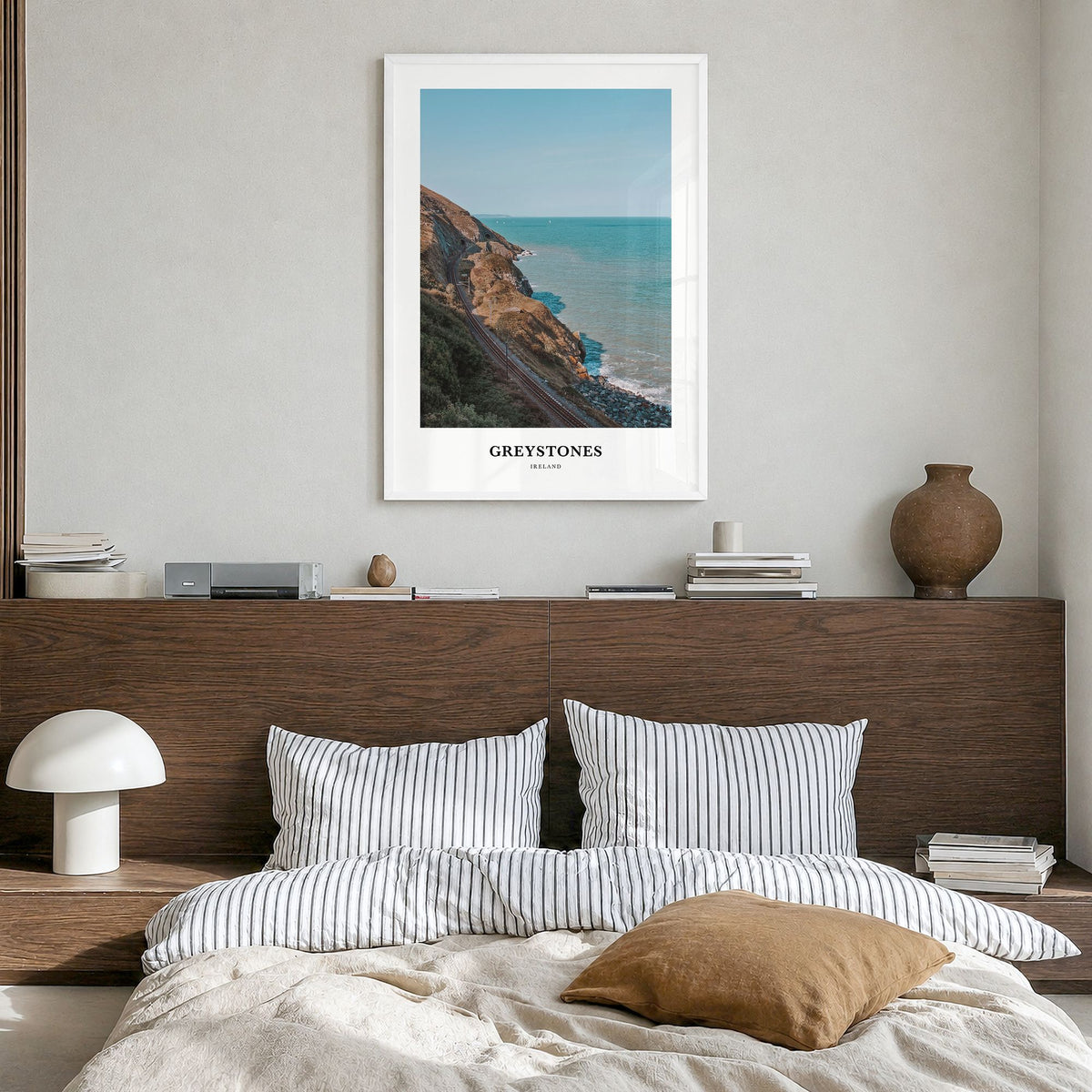 Greystones Classic Poster in a white wood frame, hanging in a bedroom