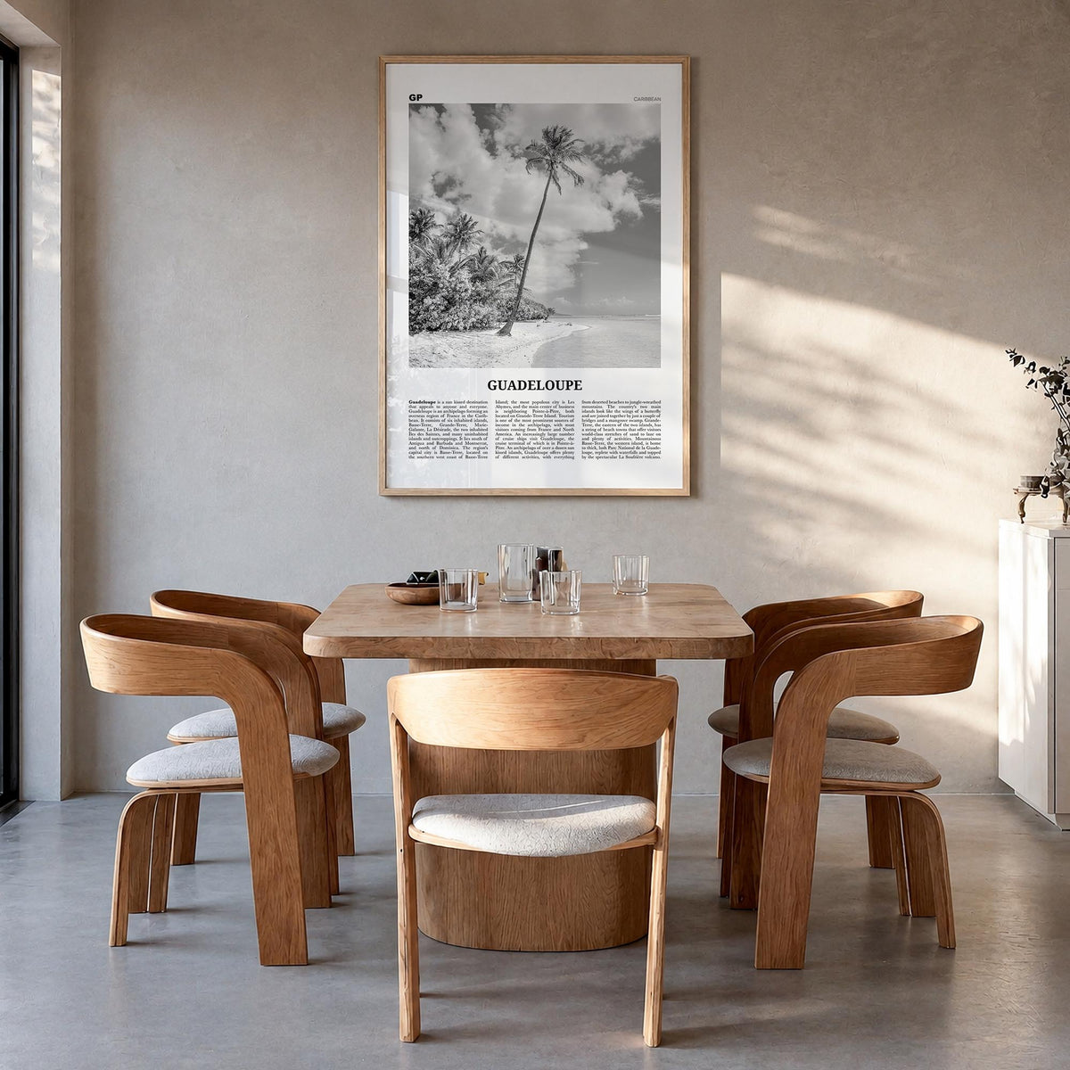 Guadeloupe black & white newspaper poster of Caribbean – vertical wall art in natural wood frame, hanging on wall
