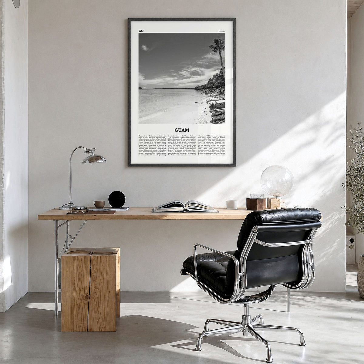 Guam Newspaper Poster in a black wood frame, hanging in a bright home office
