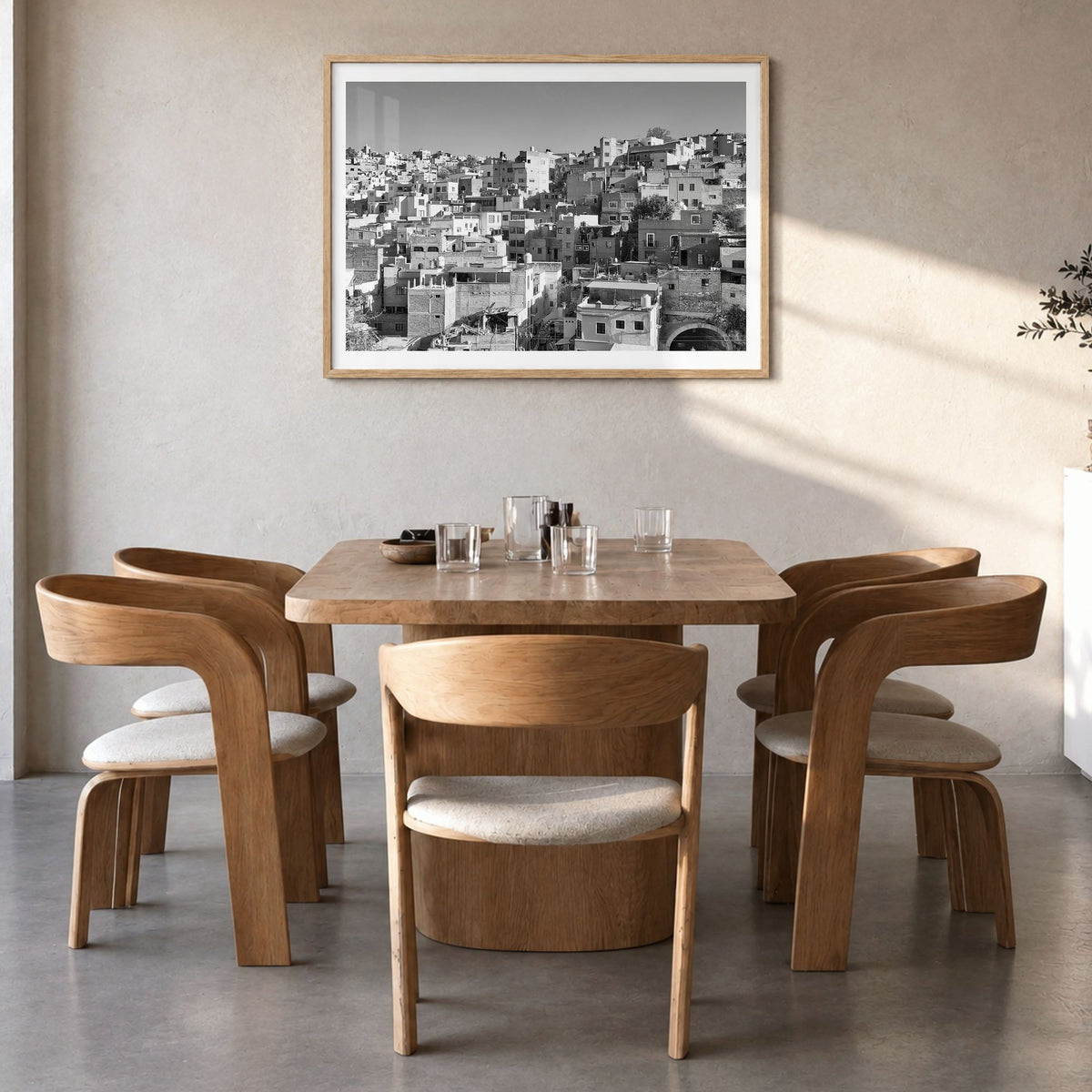 Guanajuato City Photo Poster in a natural wood frame, hanging in a dining room, white border