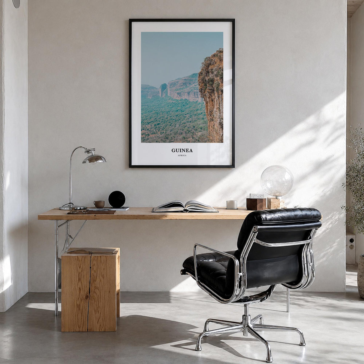 Guinea no. 2 colorful classic poster of Africa – vertical wall art in black wood frame, hanging on wall
