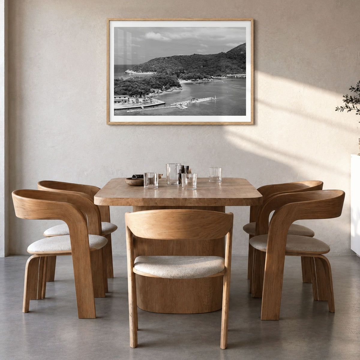 Haiti Photo Poster in a natural wood frame, hanging in a dining room, white border