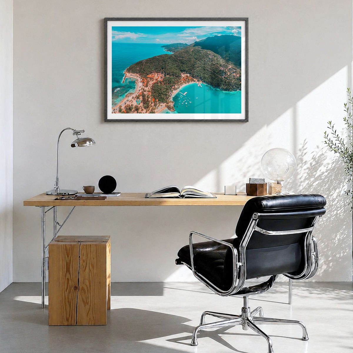 Haiti Photo Poster in a black wood frame, hanging in a bright home office, white border