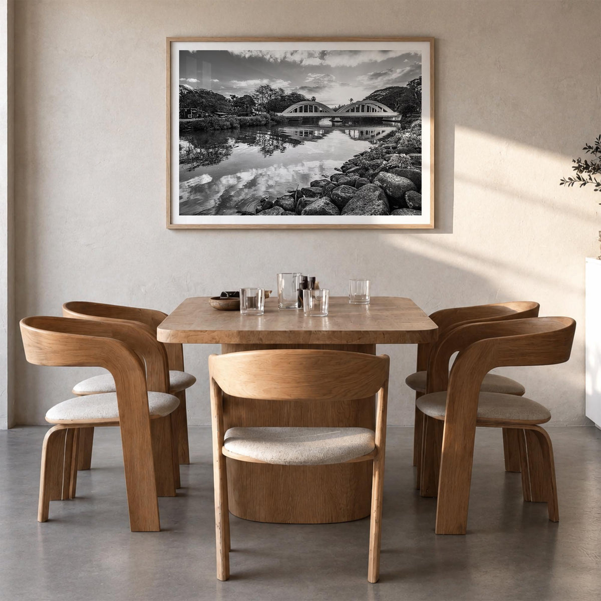Haleiwa black & white photo poster of Hawaii, USA – horizontal wall art in natural wood frame with white border, hanging on w