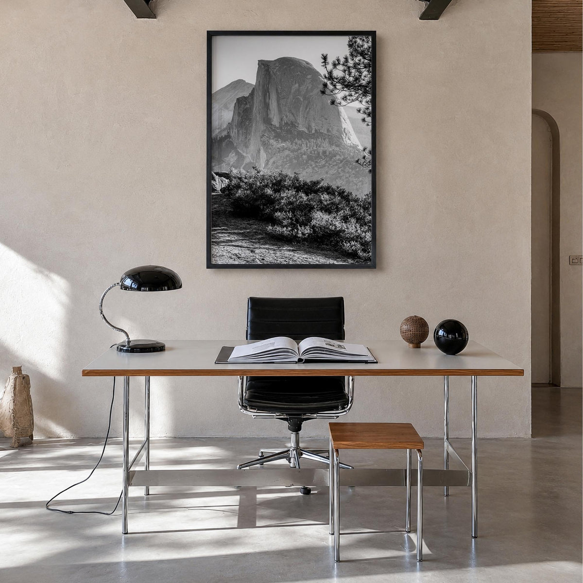 Half Dome black & white photo poster of Yosemite, California – vertical wall art in black wood frame, hanging on wall