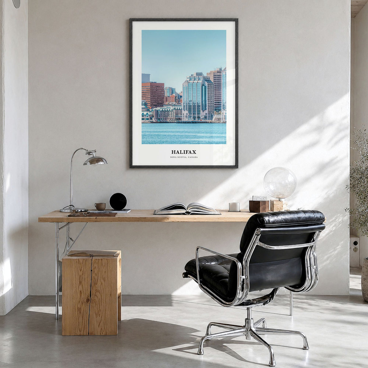 Halifax Classic Poster in a black wood frame, hanging in a bright home office