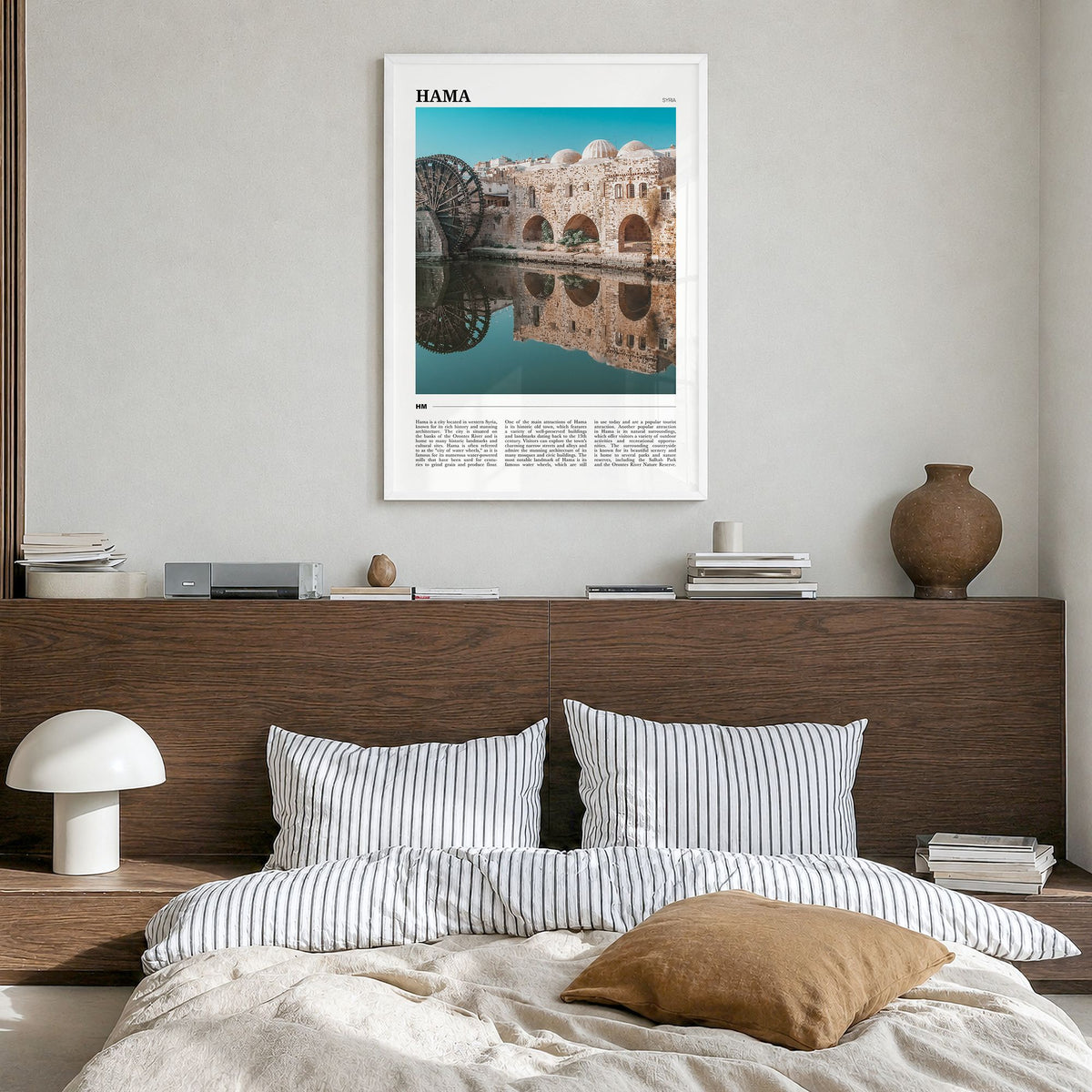 Hama Travel Poster in a white wood frame, hanging in a bedroom