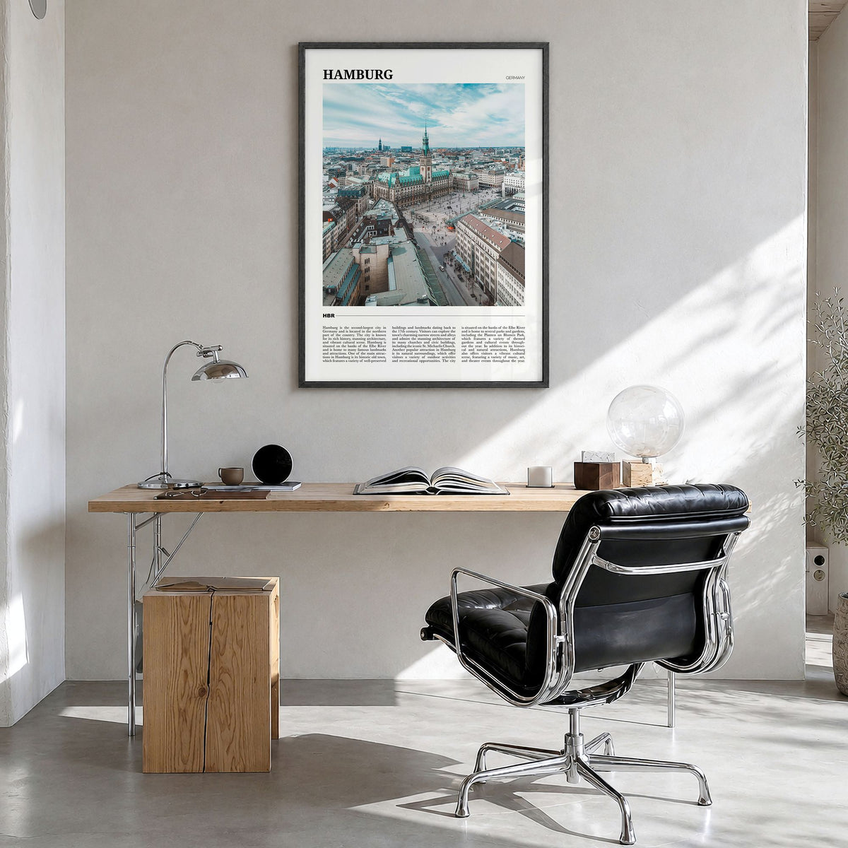 Hamburg Travel Poster in a black wood frame, hanging in a bright home office