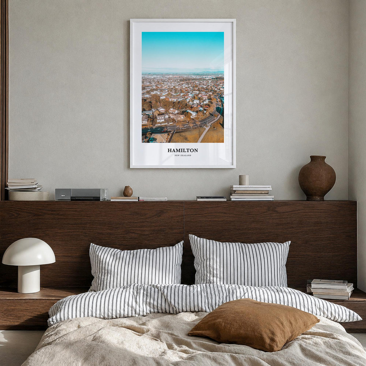 Hamilton, New Zealand colorful classic poster of New Zealand – vertical wall art in white wood frame, hanging on wall