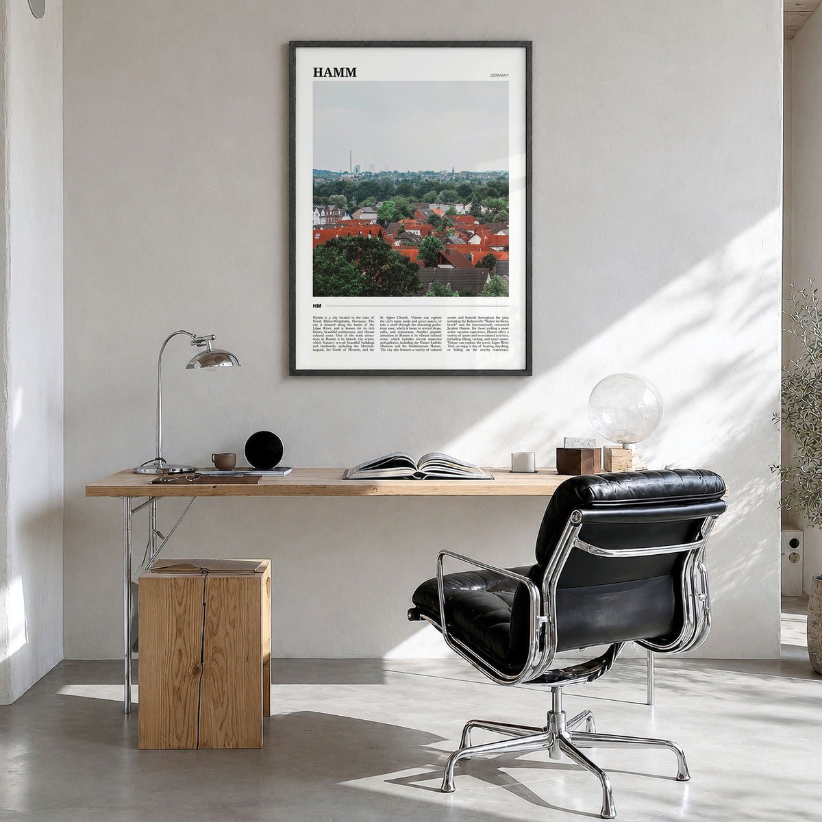 Hamm Travel Poster in a black wood frame, hanging in a bright home office