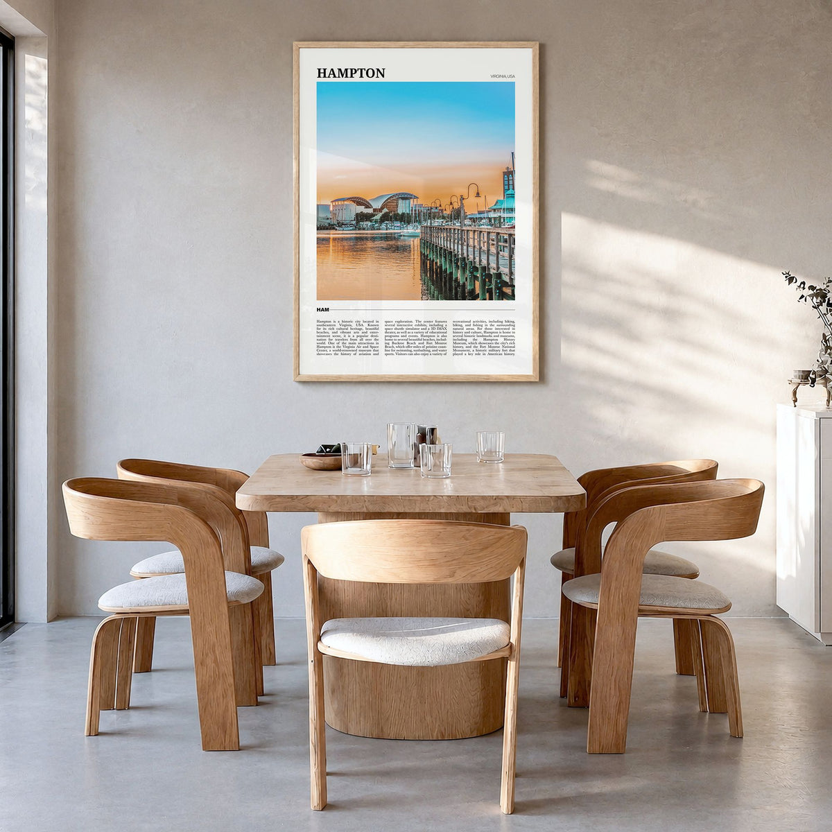 Hampton Travel Poster in a natural wood frame, hanging in a dining room