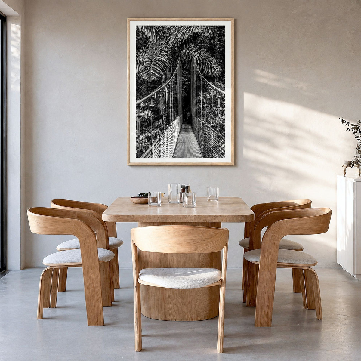 Hanging Bridge Photo Poster in a natural wood frame, hanging in a dining room, white border