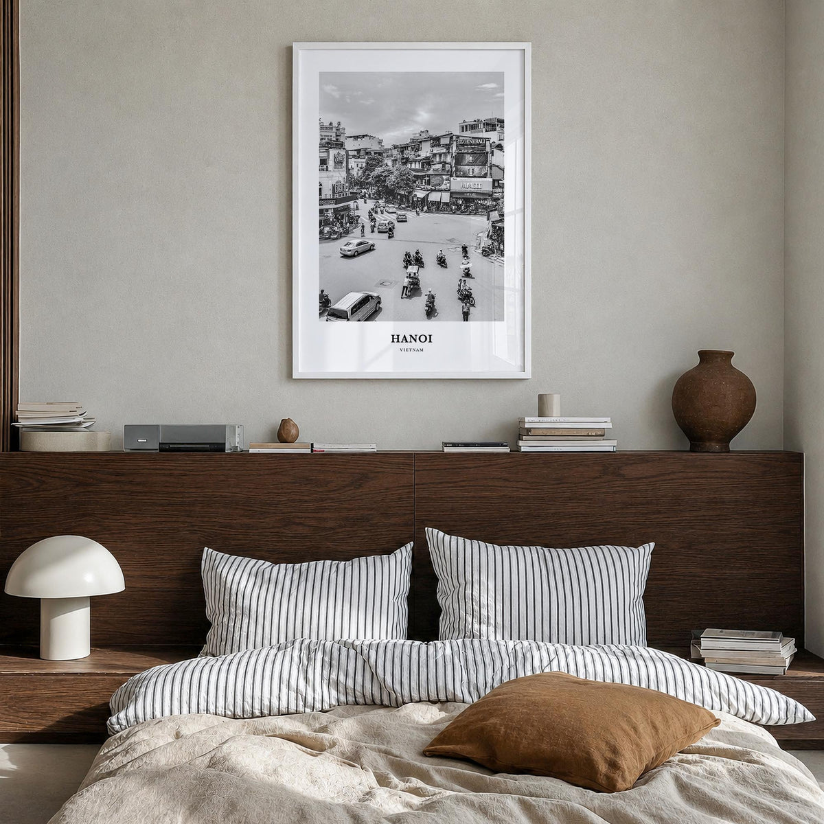 Hanoi no. 1 black & white classic poster of Vietnam – vertical wall art in white wood frame, hanging on wall