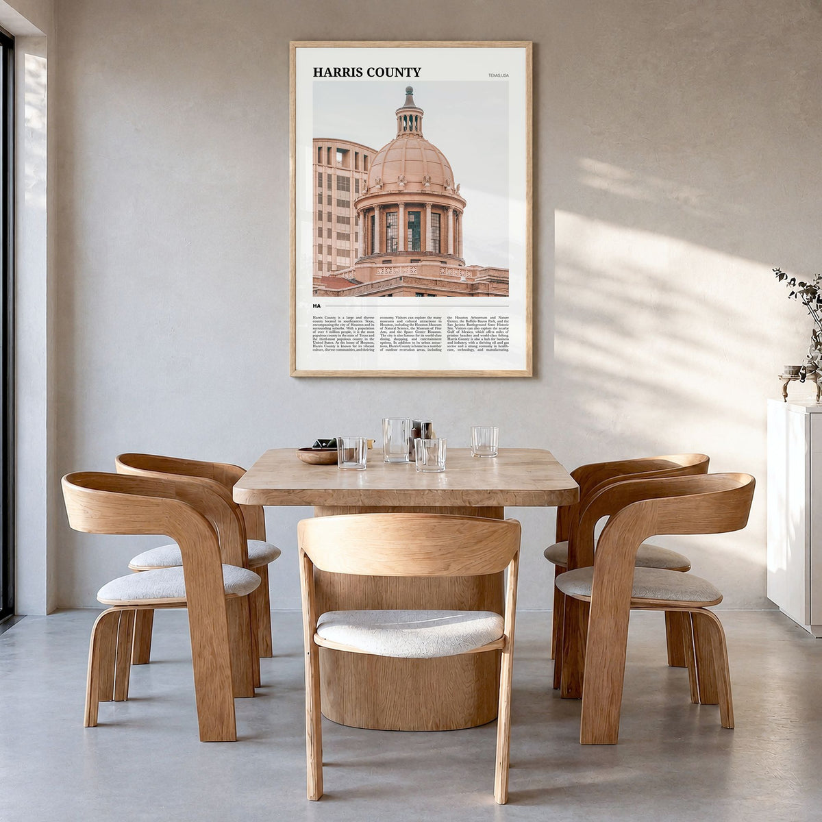 Harris County Travel Poster in a natural wood frame, hanging in a dining room