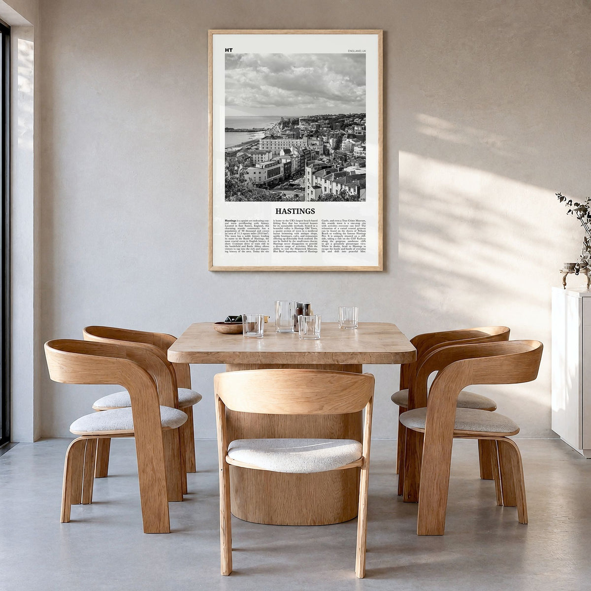 Hastings Newspaper Poster in a natural wood frame, hanging in a dining room