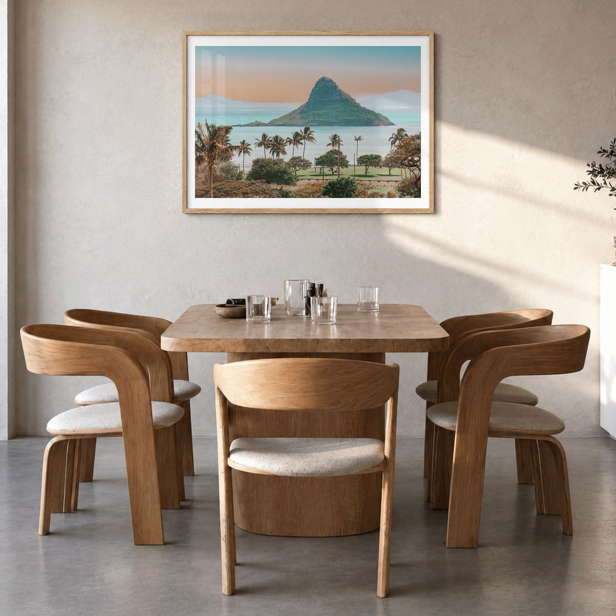 Hawaii Photo Poster in a natural wood frame, hanging in a dining room, white border