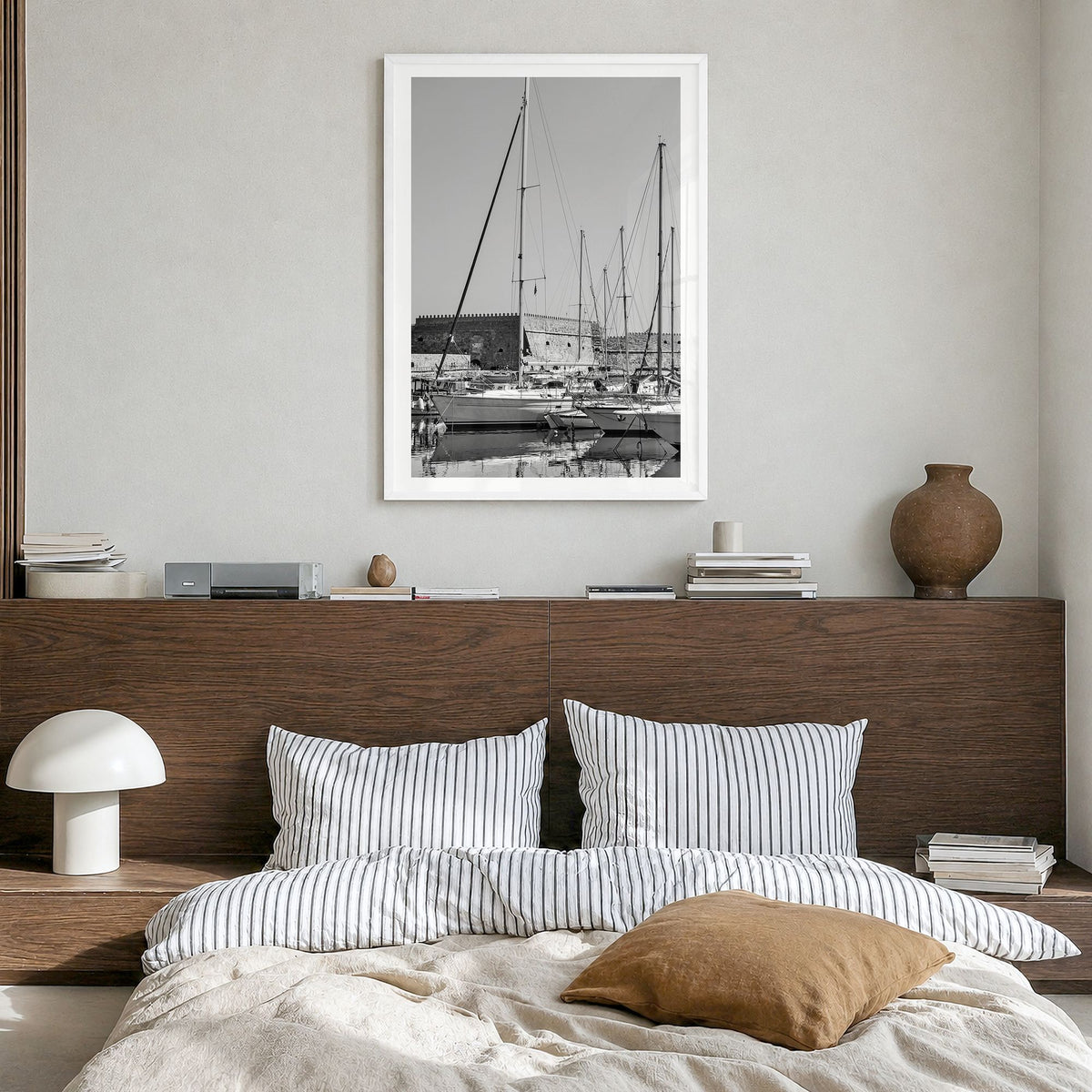 Heraklion Photo Poster in a white wood frame, hanging in a bedroom, white border