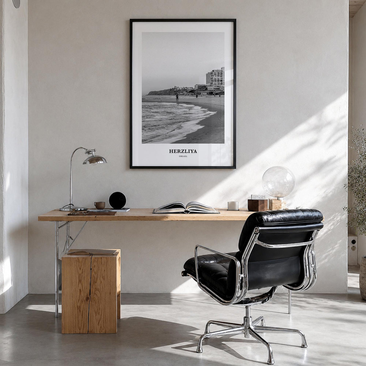 Herzliya black & white classic poster of Israel – vertical wall art in black wood frame, hanging on wall