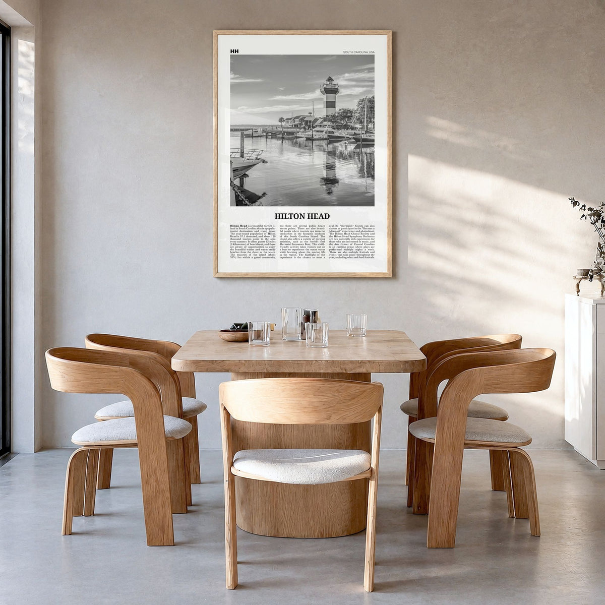 Hilton Head Island Newspaper Poster in a natural wood frame, hanging in a dining room