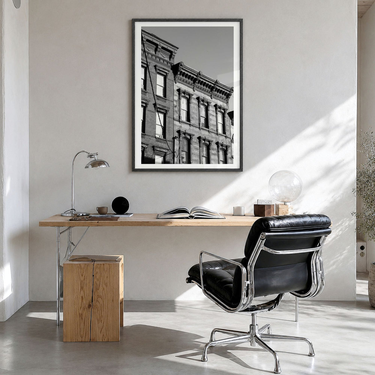 Hoboken Photo Poster in a black wood frame, hanging in a bright home office, white border