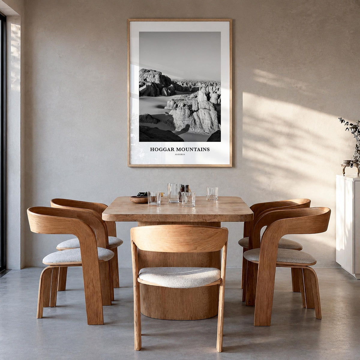 Hoggar Mountains black & white classic poster of Algeria – vertical wall art in natural wood frame, hanging on wall