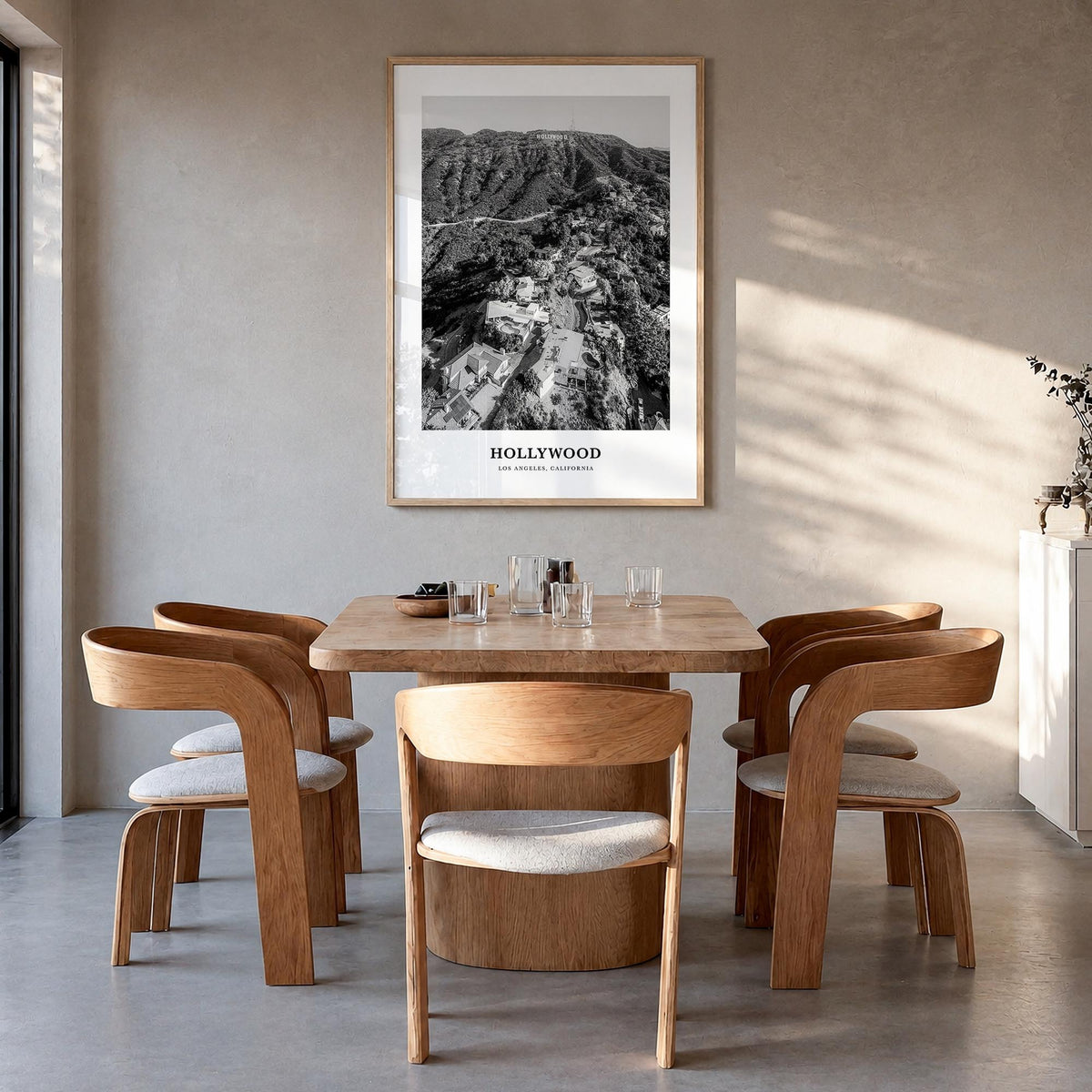 Hollywood black & white classic poster of Los Angeles, California – vertical wall art in natural wood frame, hanging on wall
