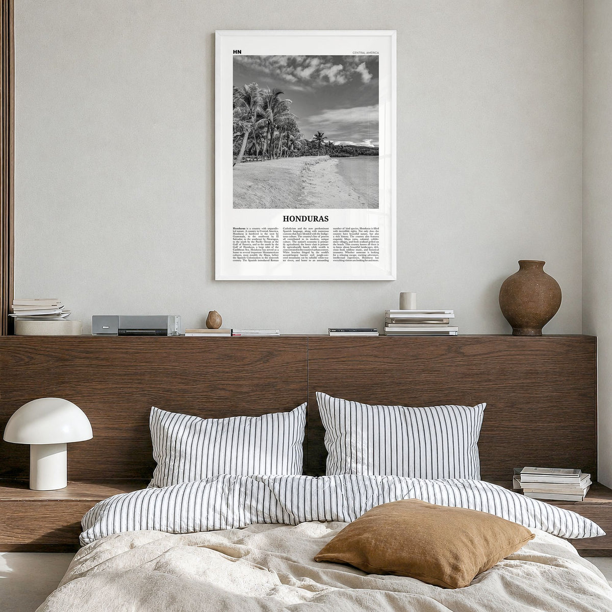 Honduras Newspaper No 1 Poster in a white wood frame, hanging in a bedroom