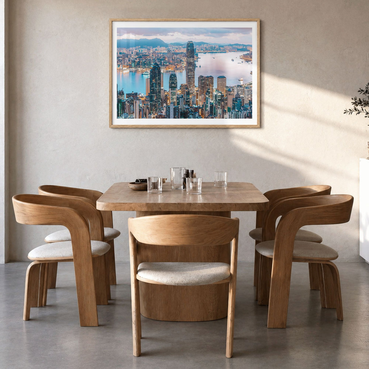 Hong Kong Photo Poster in a natural wood frame, hanging in a dining room, white border