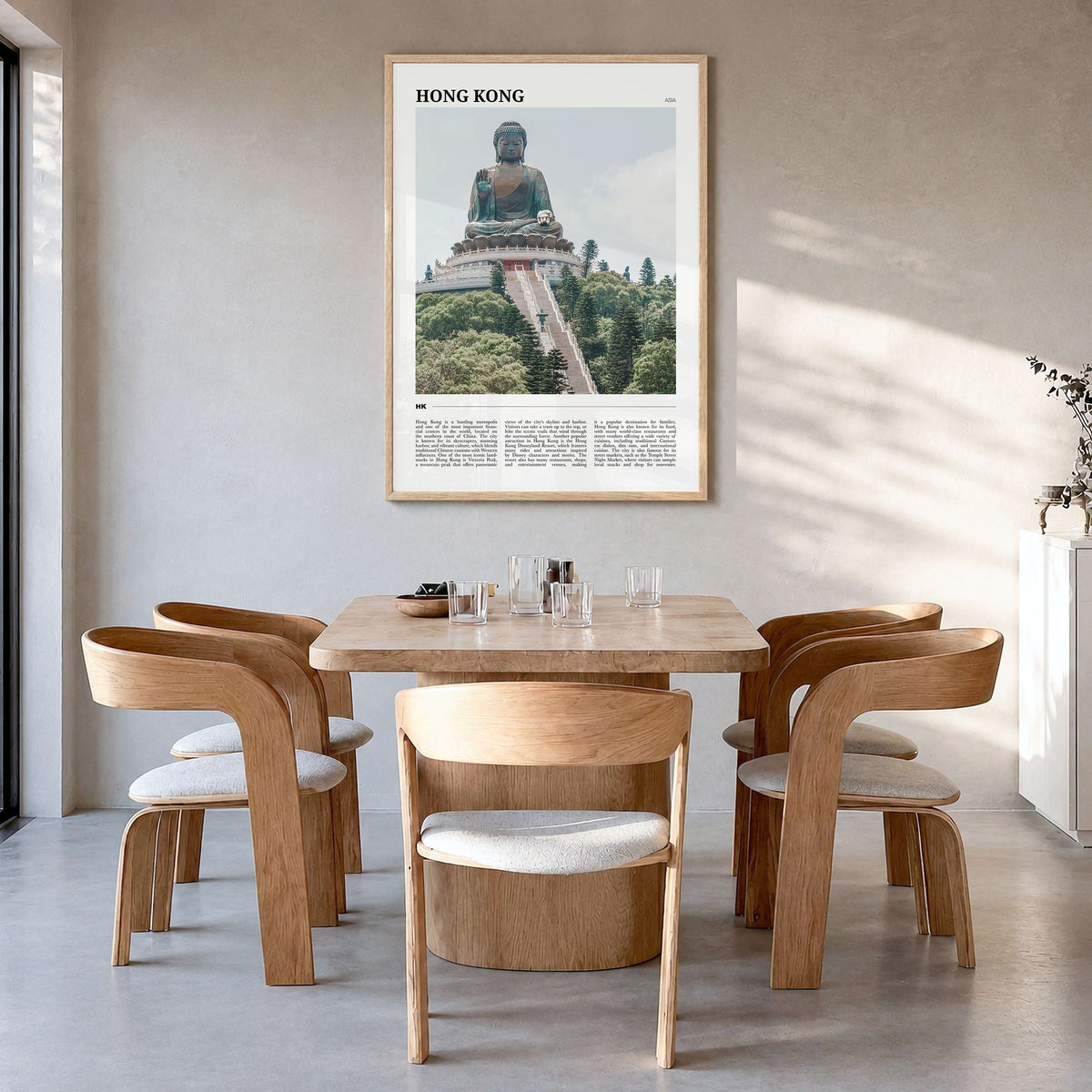 Hong Kong Travel Poster in a natural wood frame, hanging in a dining room