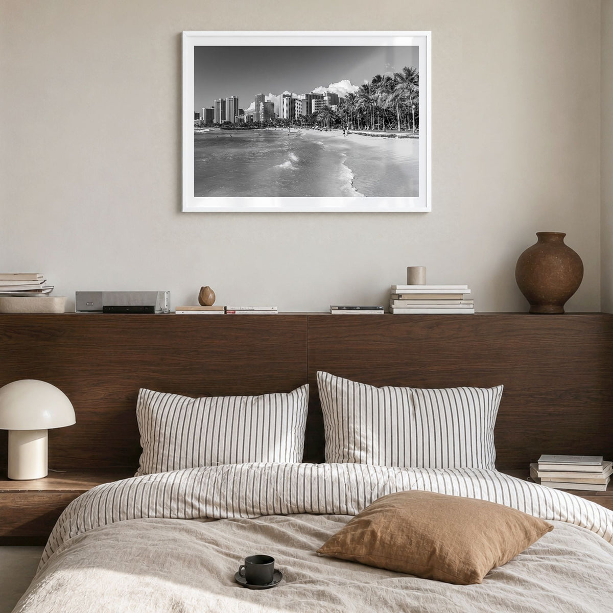 Honolulu Photo Poster in a white wood frame, hanging in a bedroom, white border