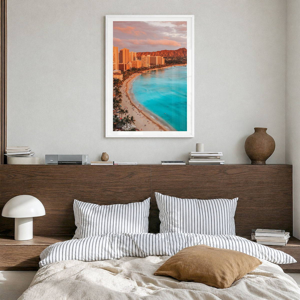Honolulu Photo Poster in a white wood frame, hanging in a bedroom, white border