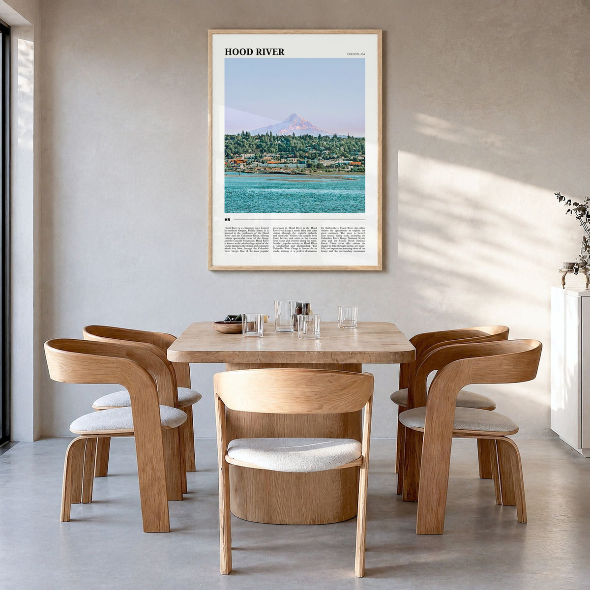 Hood River Travel Poster in a natural wood frame, hanging in a dining room