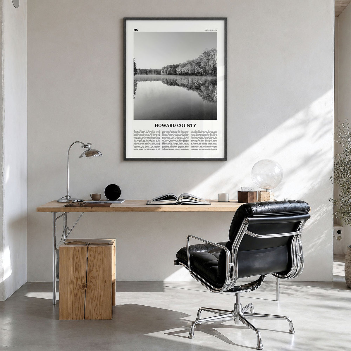 Howard County Newspaper Poster in a black wood frame, hanging in a bright home office