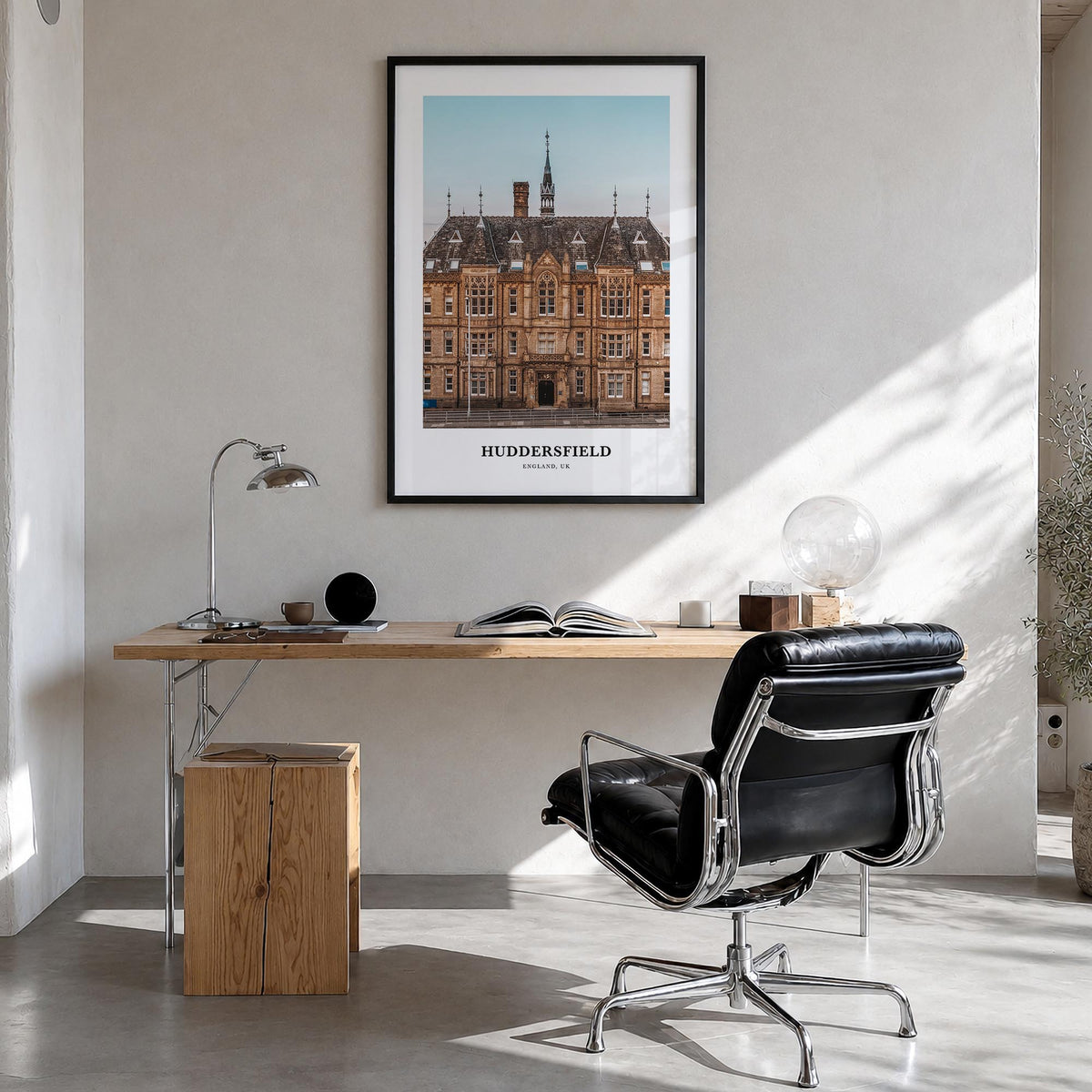 Huddersfield colorful classic poster of United Kingdom – vertical wall art in black wood frame, hanging on wall