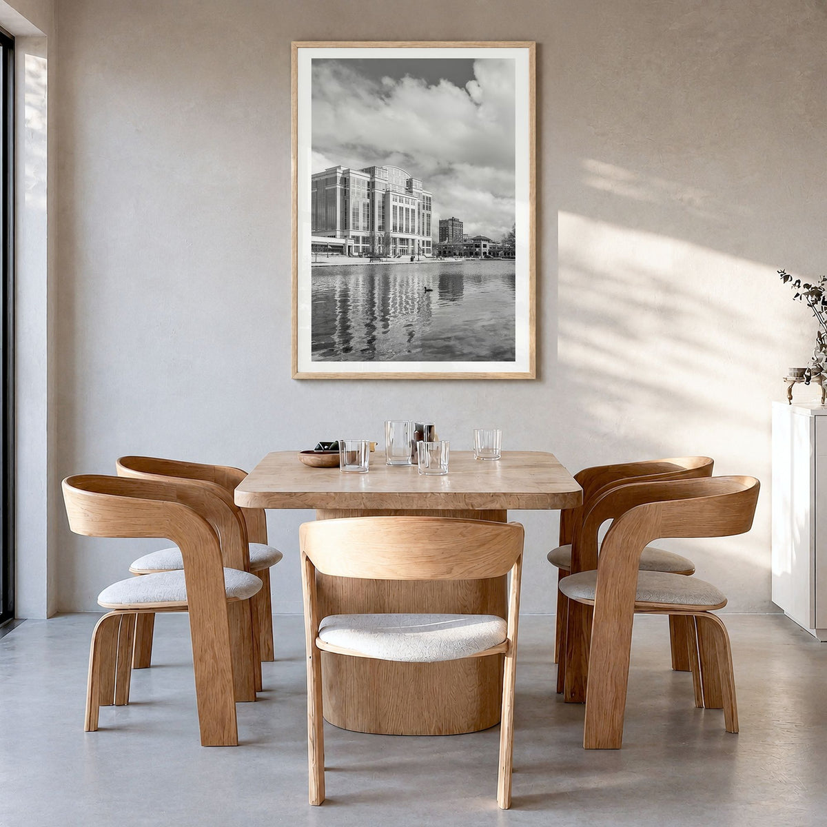Huntsville Photo Poster in a natural wood frame, hanging in a dining room, white border