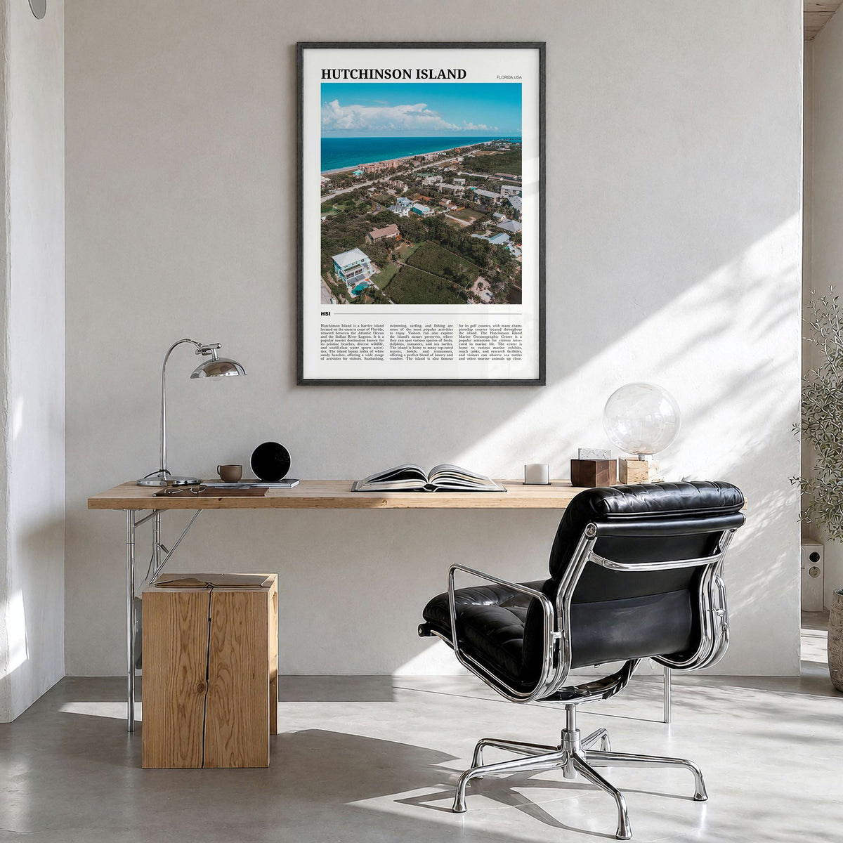 Hutchinson Island Travel Poster in a black wood frame, hanging in a bright home office