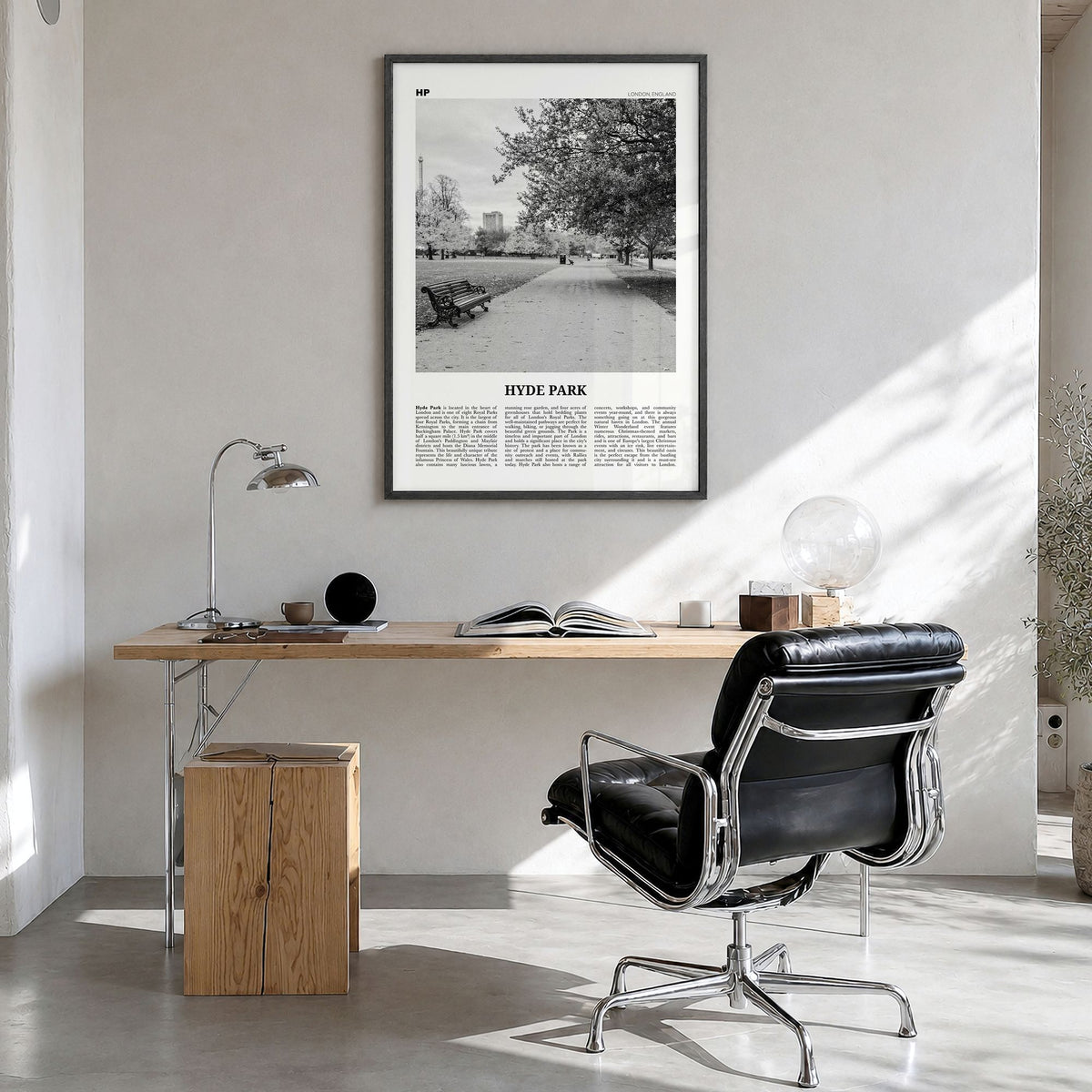 Hyde Park Newspaper Poster in a black wood frame, hanging in a bright home office