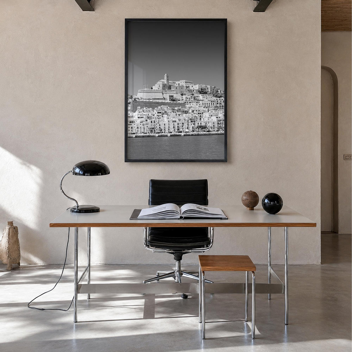 Ibiza black & white photo poster of Spain – vertical wall art in black wood frame, hanging on wall
