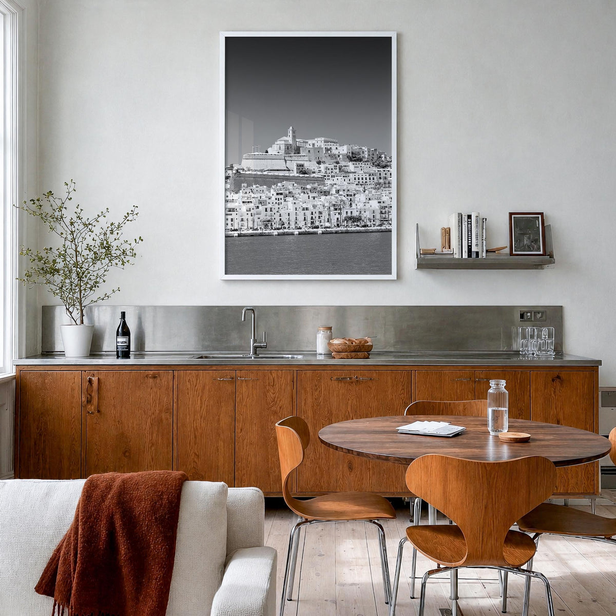 Ibiza black & white photo poster of Spain – vertical wall art in white wood frame, hanging on wall