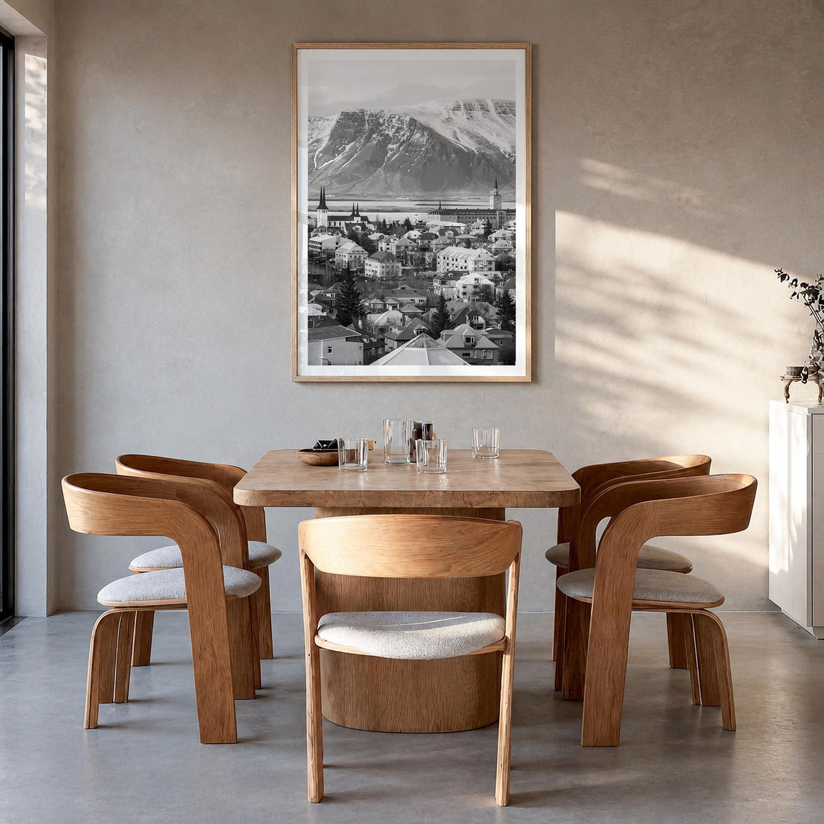 Iceland black & white photo poster of Europe – vertical wall art in natural wood frame with white border, hanging on wall