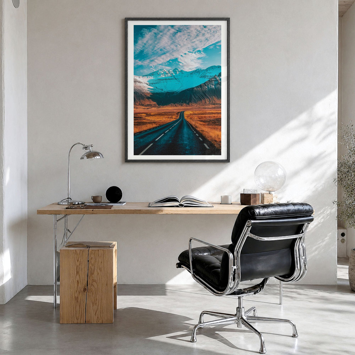 Iceland Photo Poster in a black wood frame, hanging in a bright home office, white border