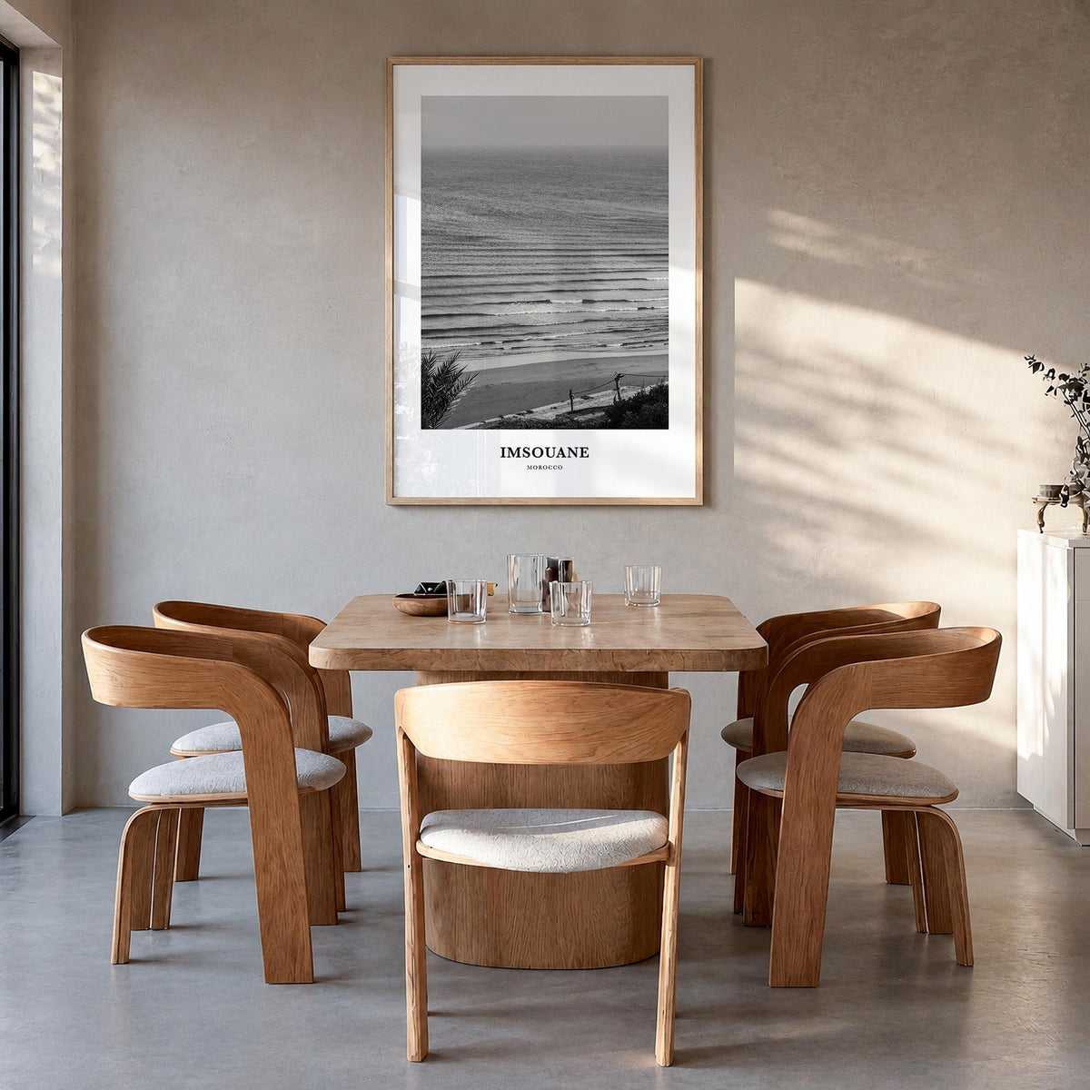Imsouane black & white classic poster of Morocco – vertical wall art in natural wood frame, hanging on wall